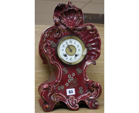 A Victorian ceramic cased eight day mantel clock