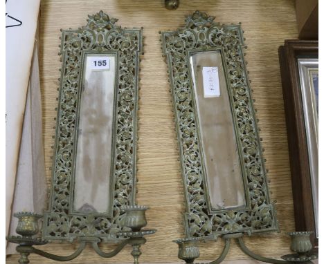 A French fan-shaped firescreen and a pair of brass girandole mirrors