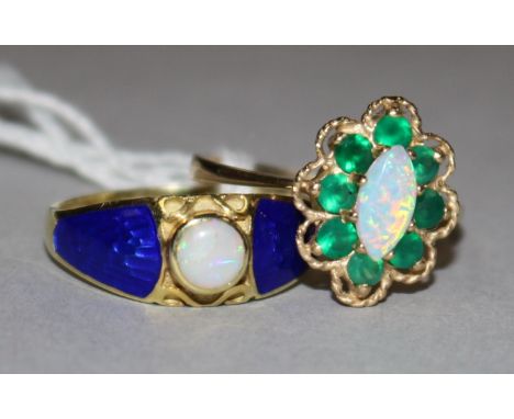 Two 9ct gold and white opal rings.