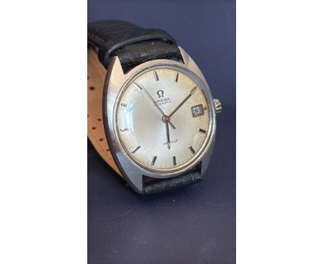Gents Omega DeVille Automatic watch features a stainless steel case and a black leather strap with a date window at 3 o'clock