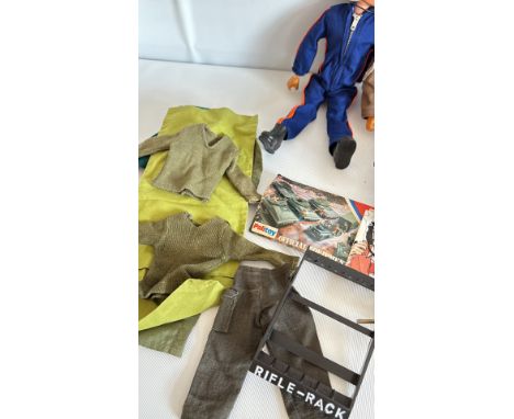 Palitoy Action Man figures with accessories, including uniforms, helmets, and weapons. Original packaging included.