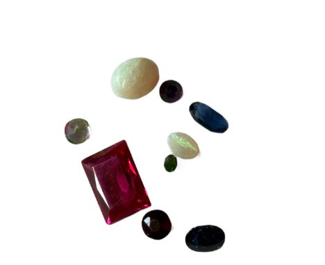 Mixed lot of precious stones to include sapphire, opal, amethyst & others Total weight 12.55ct