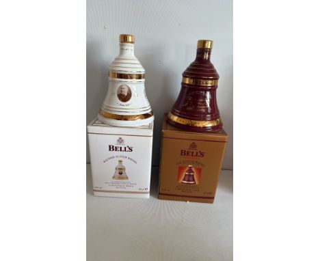 Two Bell's Blended Scotch Whisky decanters, Christmas editions 2009 and 1999, each 70cl, 40% vol, in original packaging.