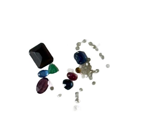 Mixed lot of precious stones to include sapphire, Topaz, Ruby, Garnet, &1 ct of diamonds