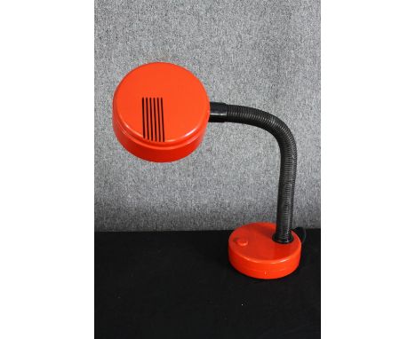 A vintage 1970's Hanimex red plastic reading lamp. H.61cm. 