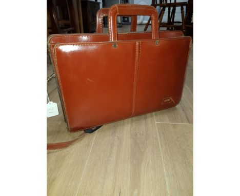 A VINTAGE LEATHER ANTLER BRIEFCASE
