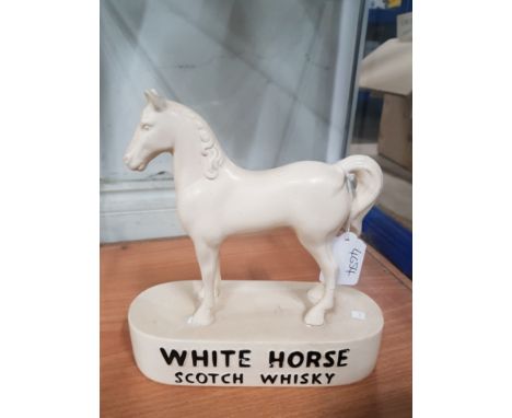 A WHITE HORSE SCOTCH WHISKY ORNAMENT