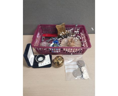 SMALL BASKET OF MISC INCLUDING HATPIN HEDGEHOG    SWISS ARMY KNIFE   COINAGE AND SILVER WINE BOTTLE COLLAR