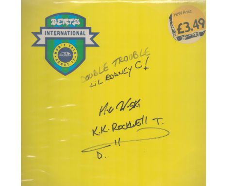 Beats International signed LP. MC Wildski Lil Rodney C and K. K Rockwell. Good condition. All autographs are genuine hand sig