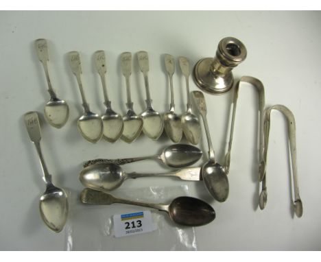 Set of six hallmarked silver teaspoons, two pairs of sugar nips, odd teaspoons etc approx 8.8oz and a weighted dwarf candlest