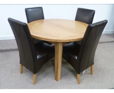Solid light oak circular extending dining table (D125cm) with fold out leaf and four high back leather chairs