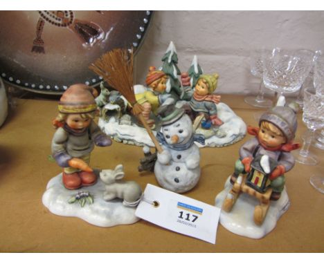 Three Hummel figures 'Ride into Christmas', 'Peaceful Offering' and a Hummel snowman