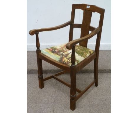 Early 20th century oak chapel chair with drop in seat upholstered with hunting scene