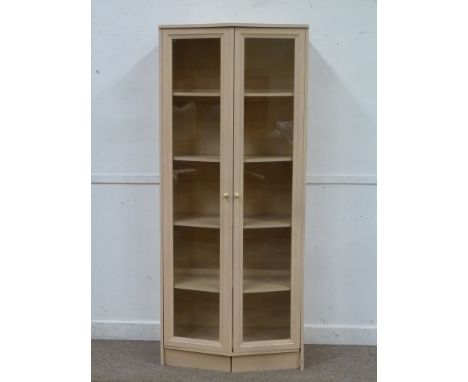 Light wood shaped front bookcase enclosed by two glazed doors, W76cm, H160cm
