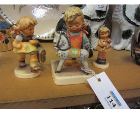 Three Hummel figures ''Horse Trainer' , 'School's Out' and 'Cuddles'