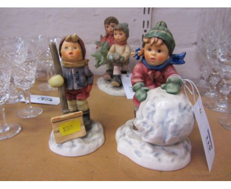 Two Hummel figure groups 'First Snow' and 'Let it Snow'