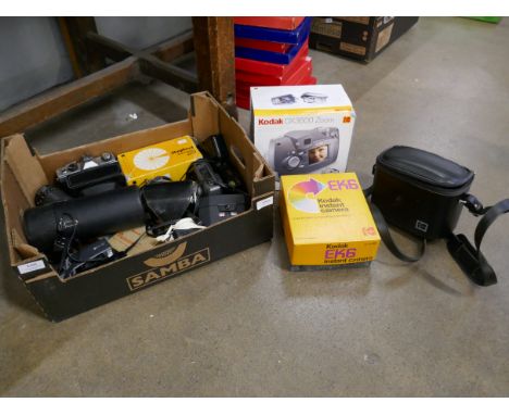 A quantity of cameras and equipment including a Praktica camera body, Vivitar Series 1 70-210mm lens, one other lens, boxed K