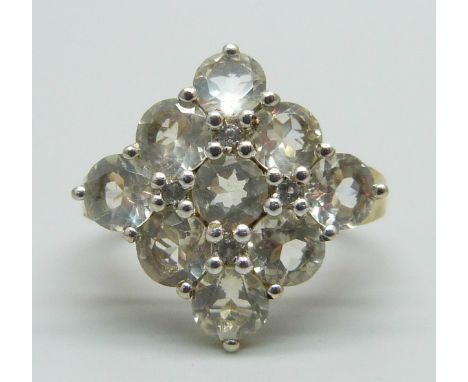 A silver gilt, serenite and topaz cocktail ring, T 