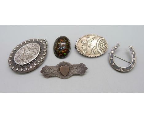 Three Victorian silver brooches and a Victorian silver locket and one other silver brooch, (locket a/f, dented, horseshoe lac
