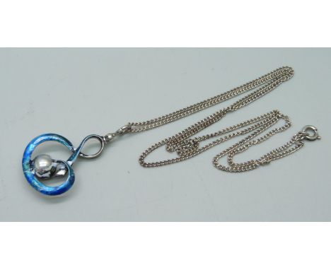 A Charles Horner silver and enamel pendant on a white metal chain, enamel a/f, 4cm 