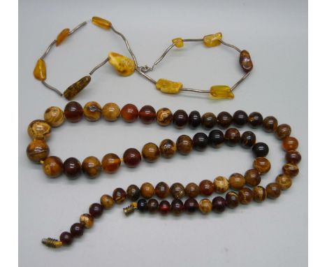 Two amber necklaces, one silver mounted 
