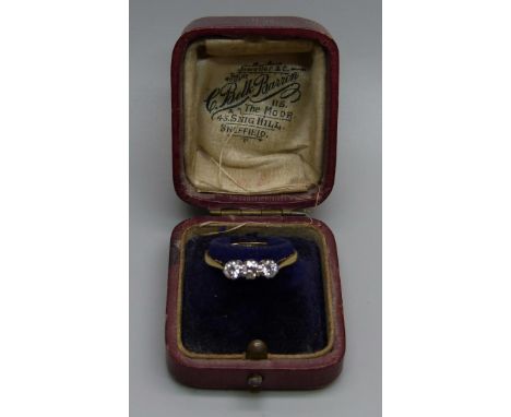 An 18ct gold and diamond trilogy ring, 2.7g, Q, in a vintage box 