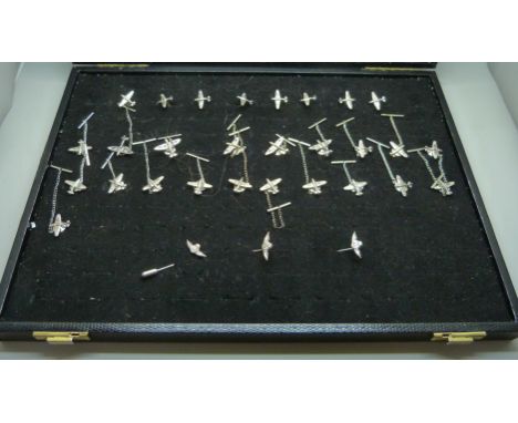 A collection of silver spitfire tie-pins, cufflinks and RAF stick pins 