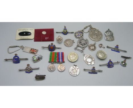 A collection of enamelled regimental brooches/badges, a silver ARP badge, fobs, medallions, a silver key ring with Union Jack