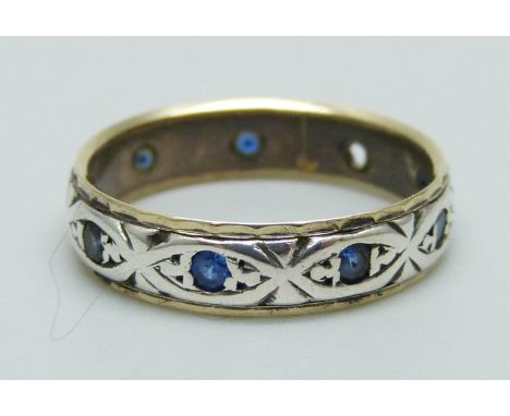 A 9ct gold and silver ring, lacking one stone, K 