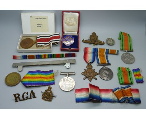 A trio of WWI medals, the Star marked 18581 Gnr. -A.Sjt. --A.C. T.B. Walsh RGA, two WWII, a Special Constabulary medal to Pet