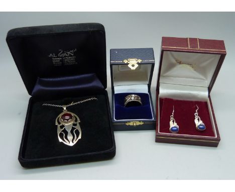 An Art Nouveau ring, a pair of silver earrings, and a pendant on a silver chain 