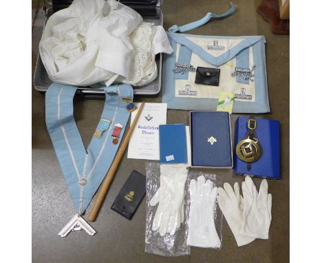 A collection of Masonic items, one silver jewel, apron, sash, badges, Bible, gloves, etc. 