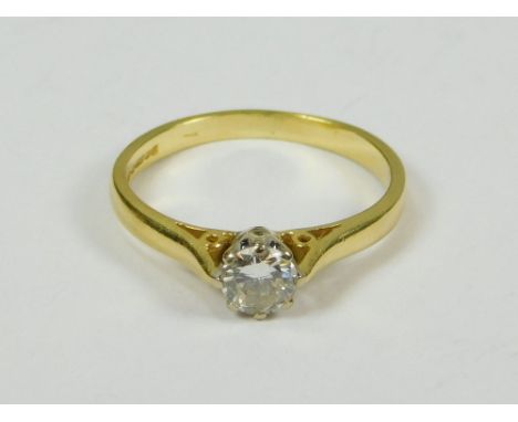 DIAMOND RING. An 18ct. gold solitaire diamond ring, the stone of approximately 0.40ct. spread. Size K.  Please note that all 