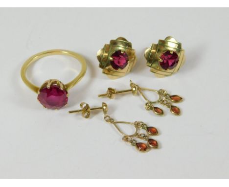 GOLD EARRINGS ETC. A pair of 9ct. gold earrings set synthetic pink stones, a yellow metal ring, also set a synthetic pink sto