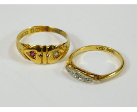 GOLD RINGS. An 18ct. gold ruby & diamond ring & an 18ct. gold illusion set diamond ring.  Please note that all items in this 