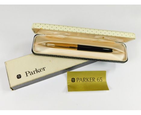 PARKER 65. A Parker 65 fountain pen with 12ct. gold plated cap & 14ct. gold streamlined nib. Black & White polka dot box, ins