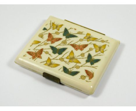 POWDER COMPACT. An Art Deco celluloid powder compact by LSM. Apparently unused. 8.5 x 8cm.  Please note that all items in thi