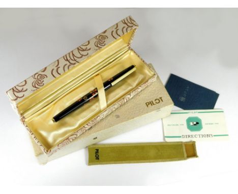 PILOT PEN. A Pilot lacquered fountain pen with floral decoration, signed. 18ct. gold Pilot nib, No. H1278. Sac filler & with 