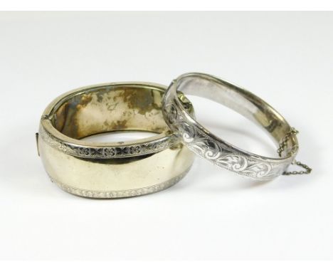 SILVER BANGLE ETC. A hallmarked hinged silver bangle & one other large cuff bangle, unmarked.  Please note that all items in 