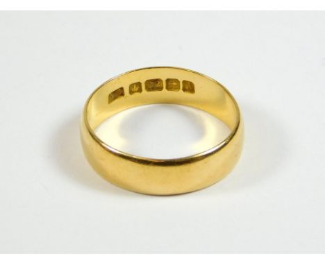WEDDING BAND. A 22ct. gold wedding band. Size R. Approx. 4.9g.  Please note that all items in this auction are previously own