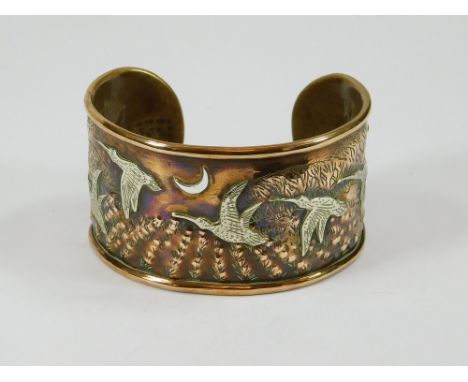 CORNELIUS J. VAN DOP. A rare & unusual cuff bangle in mixed metals by Cornelius J. Van Dop, showing curlews flying in moonlig