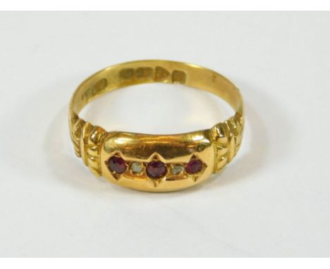 GOLD RING. An early 20th century ruby & old cut diamond ring. Size P.  Please note that all items in this auction are previou