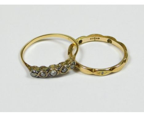 GOLD RINGS. A 9ct. gold ring set a row of old cut diamonds & a 9ct. gold eternity ring set with six small diamonds.  Please n