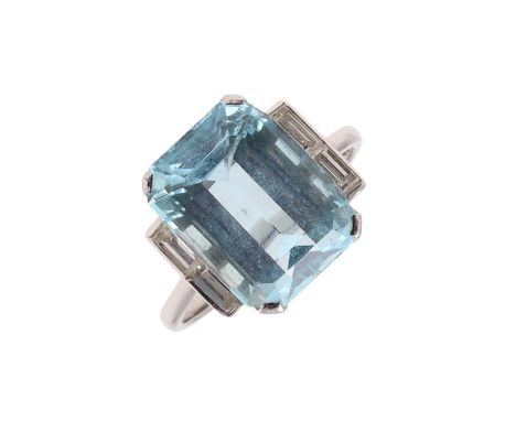 the step-cut aquamarine is set with two baguette-cut diamonds to each shoulder, in platinum, 6 grams. Size O.  *CR  chips to 