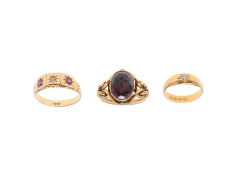 set with an oval-shaped garnet engraved with a cross, inscription to the reverse dated for 1859, with knotted decoration to t