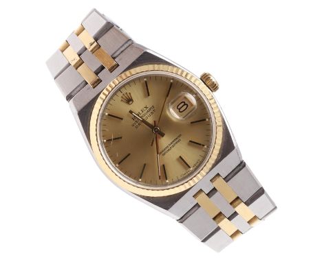 signed circular gold coloured dial, with Rolex logo to the winder and to the bracelet clasp, case number 9 129260, on a stain