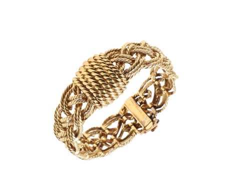 the concealed square shaped dial with Arabic quarters, on a woven plaited design bracelet, signed Boucheron to the reverse an