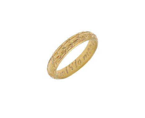 the gold band is decorated with three concentric bands of incised, asymmetrical chevrons, and with an incised design of a rec