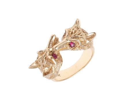 realistically formed as two fox heads with ruby eyes, 8 grams. Size G.  *CR  good vintage condition.