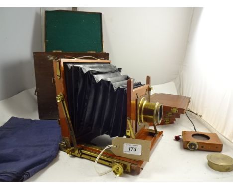 BRASS AND MAHOGONY WET PLATE CAMERA WITH J LANCASTER PATENT BIRMINGHAM LENS, PLATES AND EXTRAS IN WOODEN BOX